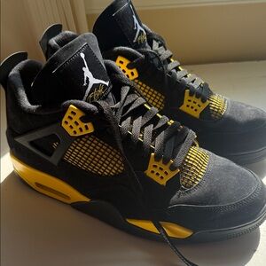 Air Jordan 4 Metro Thunder Sneakers in Black and Yellow